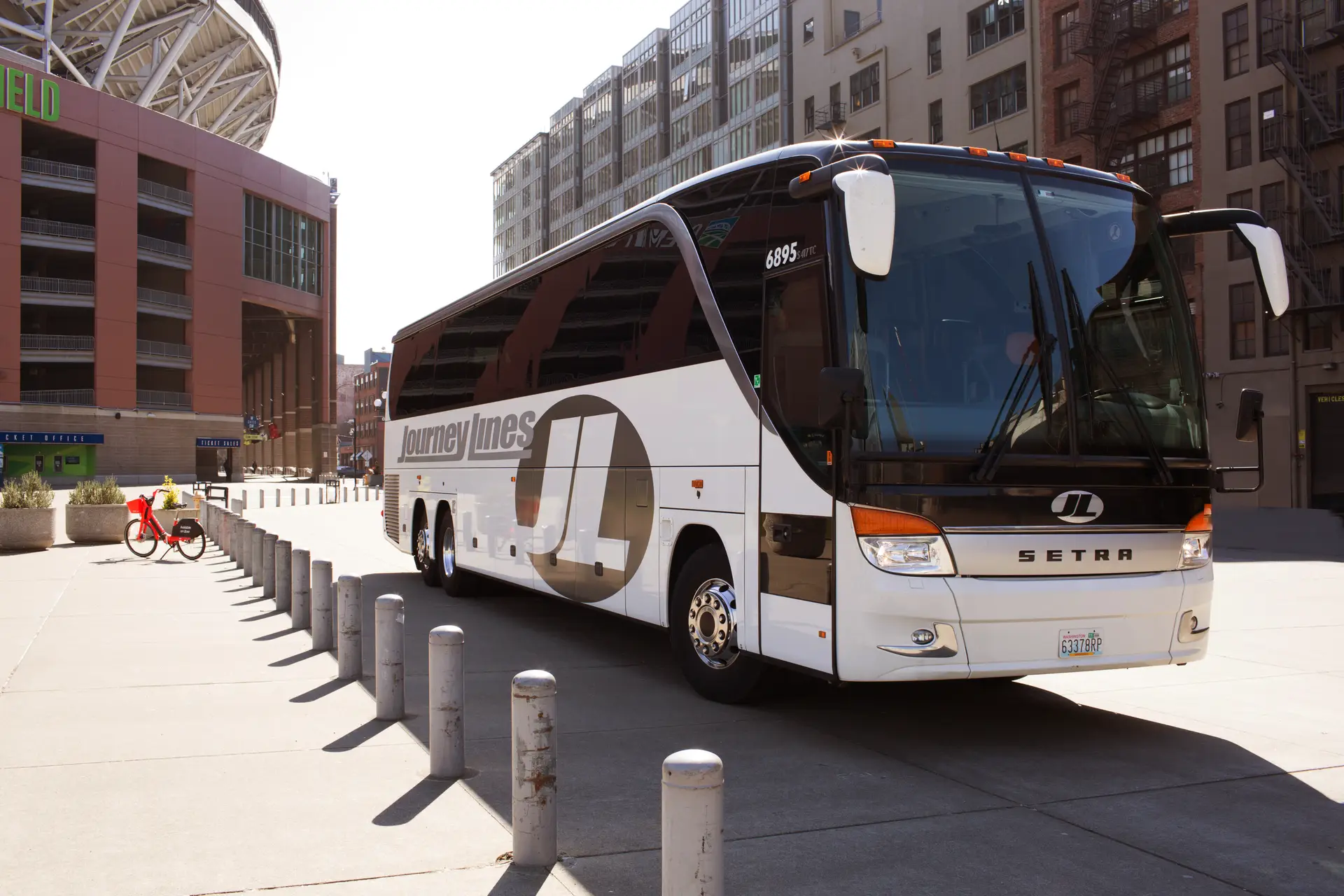 Journey Lines Charter Bus Parked in the middle of the city - side view